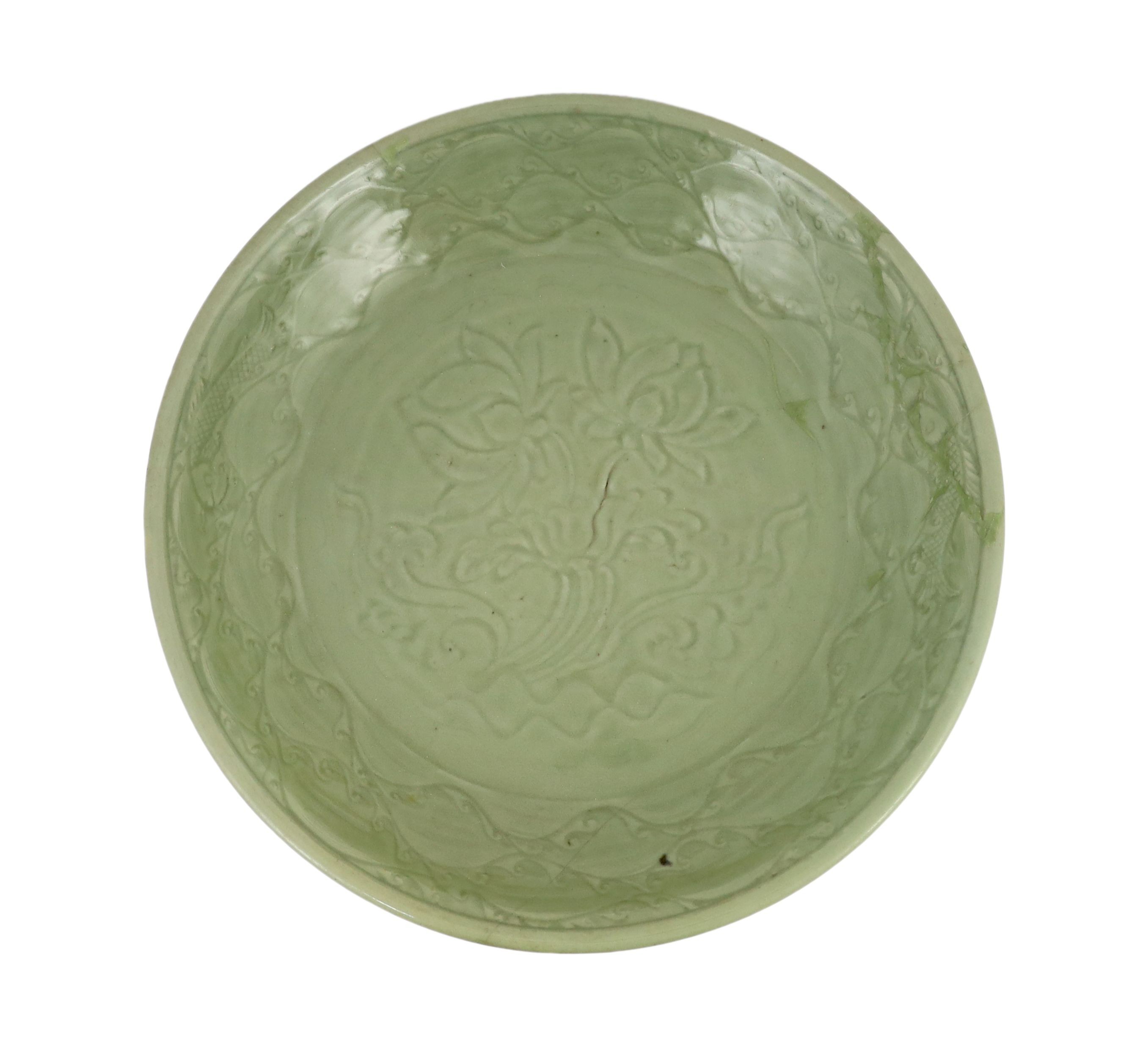 A rare large Chinese Ming Longquan celadon dish, 14th century, 44 cm diameter, Broken and restored